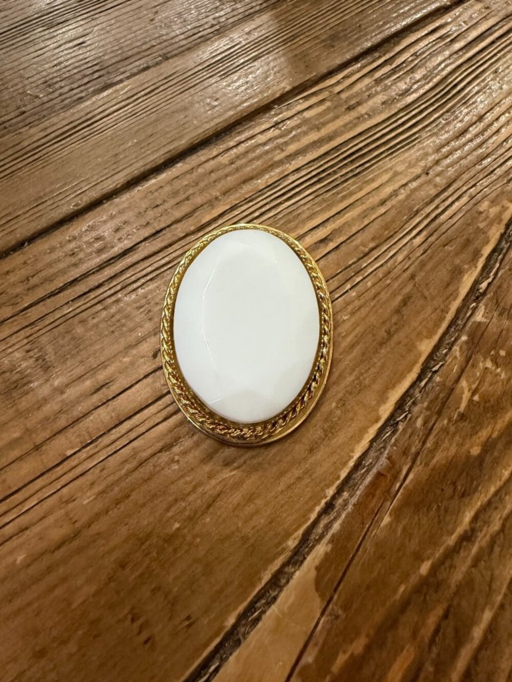 Oval White Cabochon in Gold-Tone Setting
